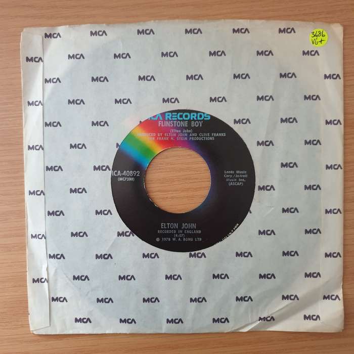 Elton John  Ego / Flinstone Boy - Vinyl 7" Record - Very-Good+ Quality (VG+) (verygoodplus)