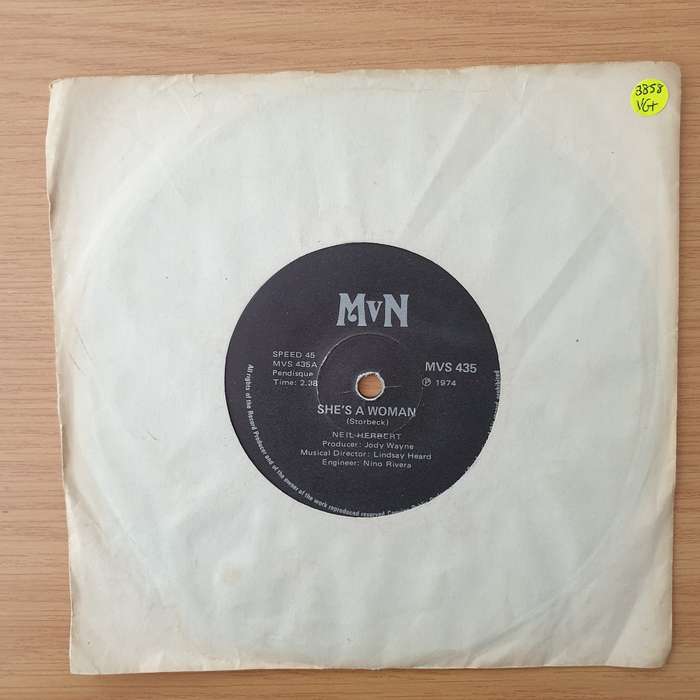 Neil Herbert  She's A Woman - Vinyl 7" Record - Very-Good+ Quality (VG+) (verygoodplus)