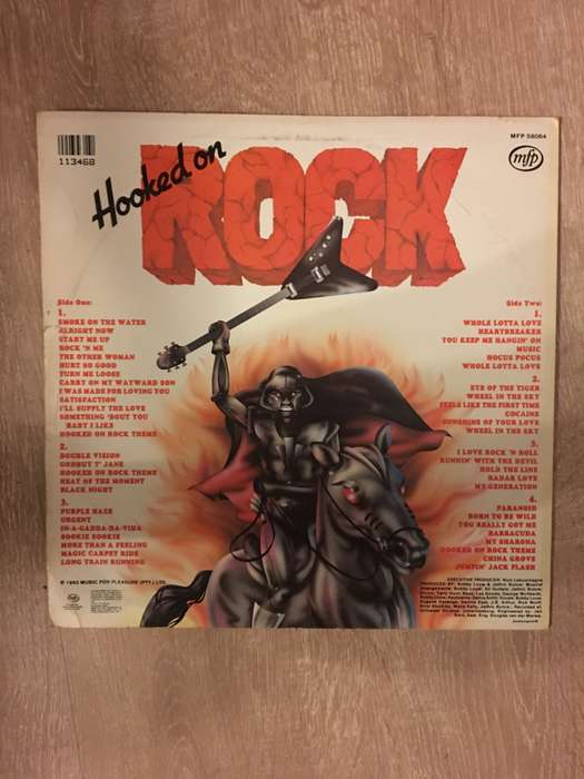 Hooked On Rock - Iron Fist - Vinyl LP Record - Opened  - Very-Good Quality (VG)