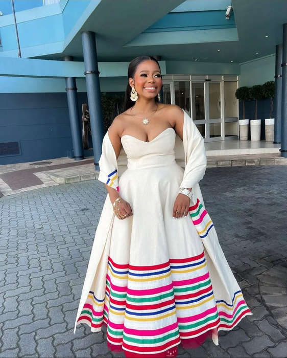 Elegant Rainbow Striped Strapless Maxi Dress with Matching Cape