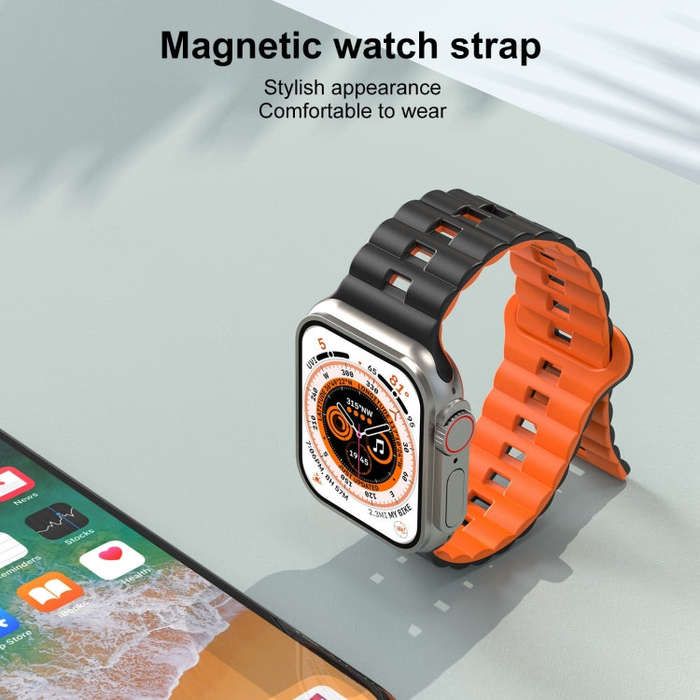 For Apple Watch Ultra 2 49mm Reverse Buckle Two Color Magnetic Silicone Watch Band(Starlight+Orange)