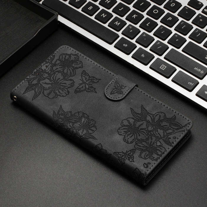 For Motorola Edge 50 Pro Cherry Blossom Butterfly Skin Feel Embossed PU Phone Case(Black)