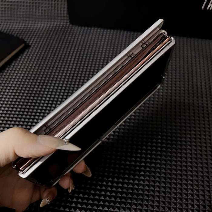 For Huawei Mate X6 Kevlar Carbon Fiber Spring Axis Nameplate Shockproof Phone Case(Purple)