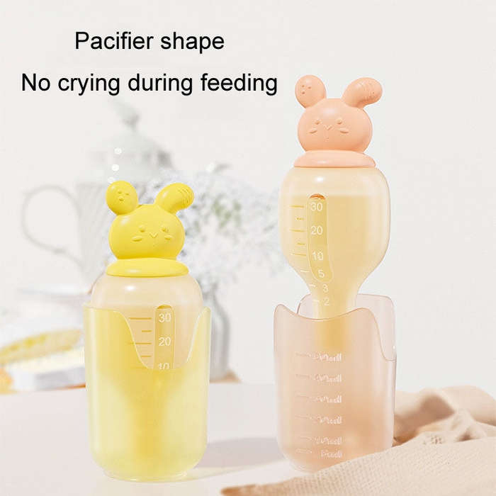 Baby Pacifier Medicine Feeder Pressing Infant Feeding Dropper Silicone Water Feeder(Pink)