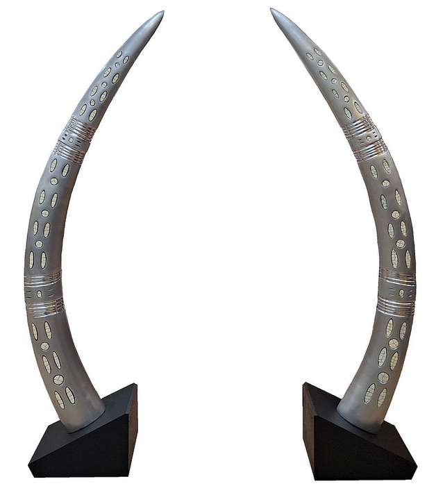 Elephant Aluminium Tusk Pair with Ostrich Eggshell inlay . Mounted on Black wood Stands