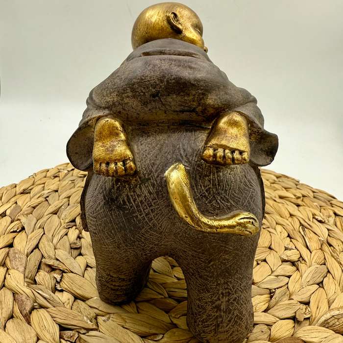 Monk on Elephant Statue (Right facing)