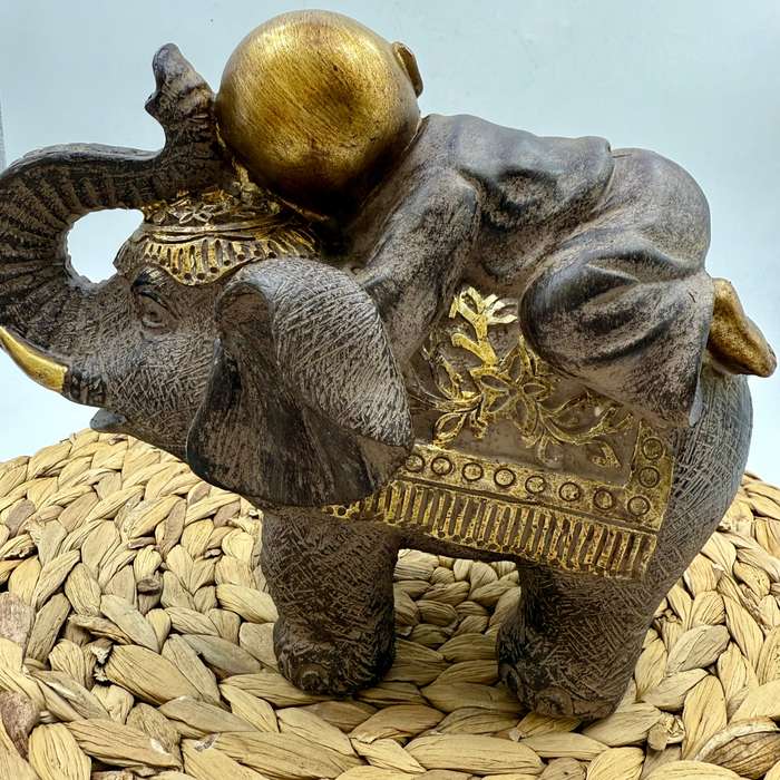 Monk on Elephant Statue (Right facing)
