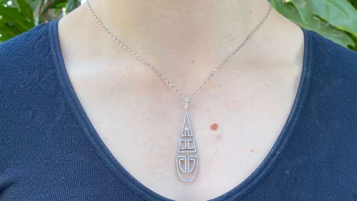 18K gold diamond Art Deco style geometric pendant.