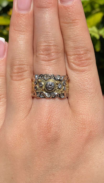 18K gold diamond ring.