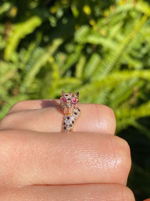 18K gold ruby and diamond leopard ring.