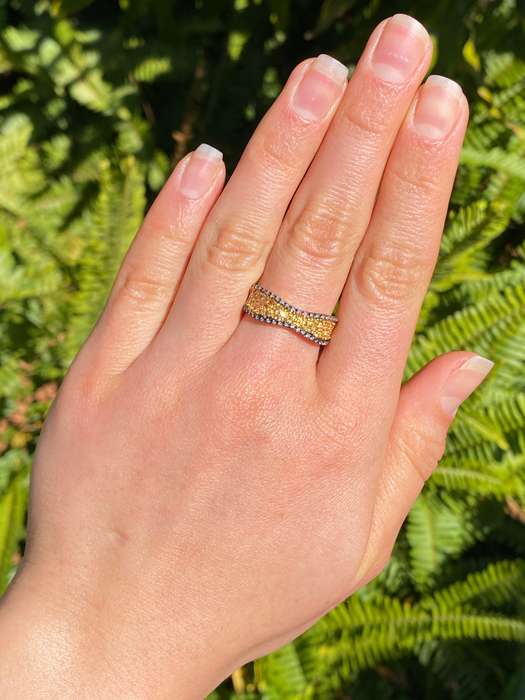 18K gold diamond band ring.