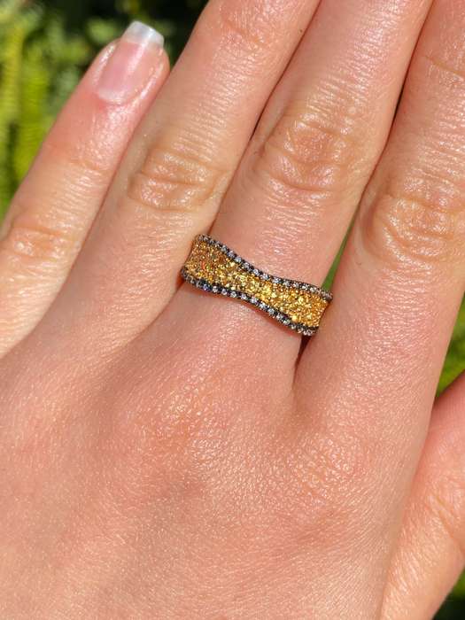 18K gold diamond band ring.