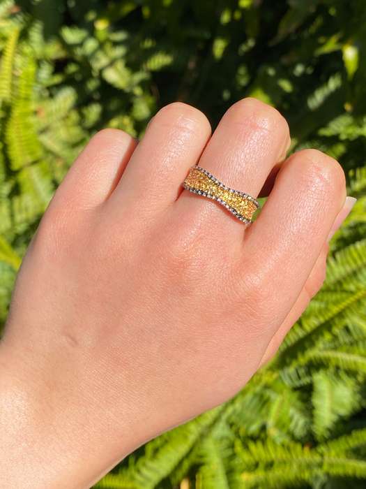 18K gold diamond band ring.