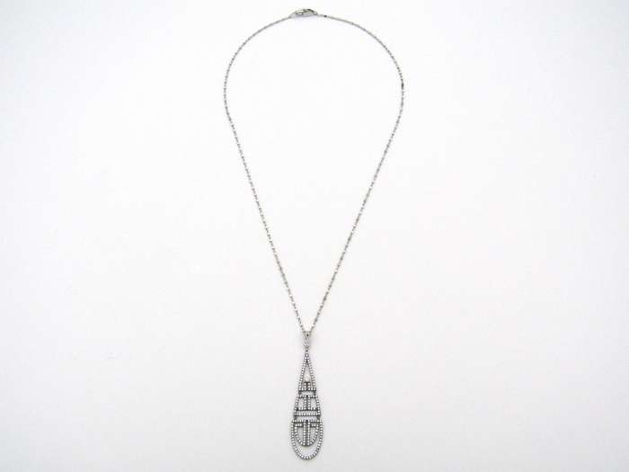 18K gold diamond Art Deco style geometric pendant.