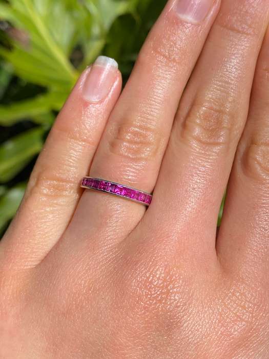 Platinum synthetic ruby eternity ring, circa 1990's.