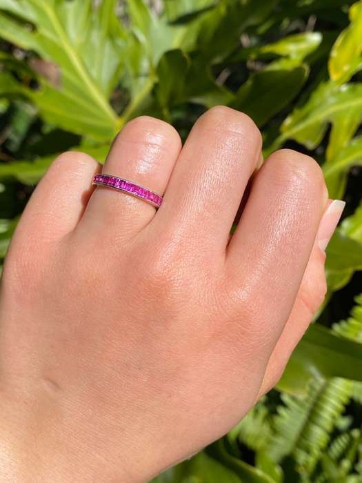 Platinum synthetic ruby eternity ring, circa 1990's.