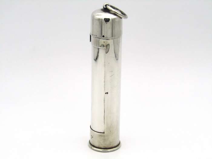 Sterling silver thermometer with swivelling case.