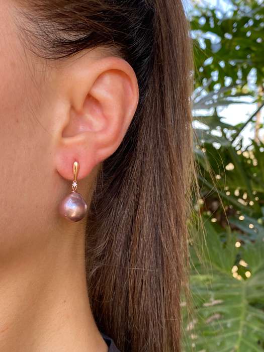 9K gold freshwater pearl and diamond dangle earrings.