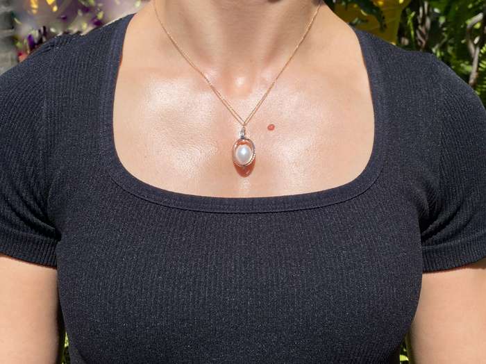 18K tri-gold freshwater pearl pendant with 18K gold chain.