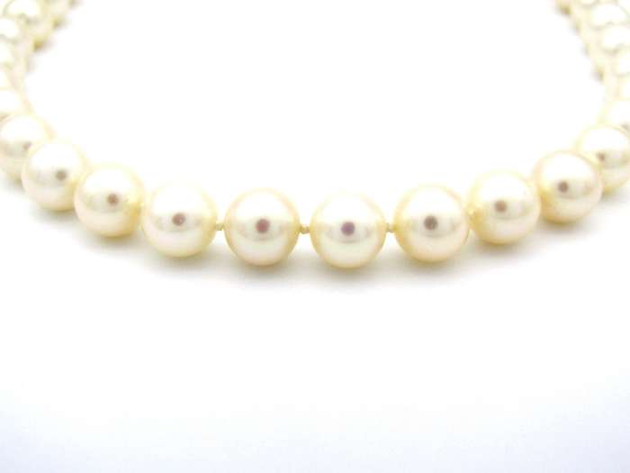 18K gold pearl and diamond necklace by Browns.