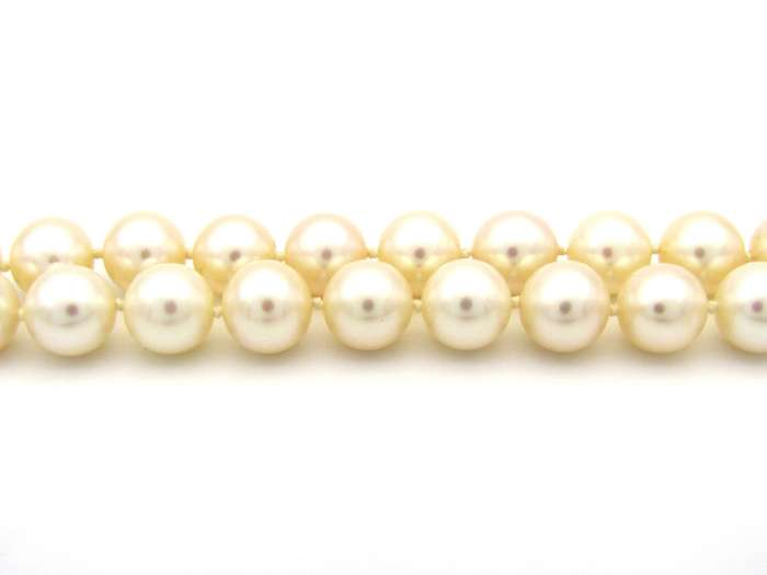 18K gold pearl and diamond necklace by Browns.