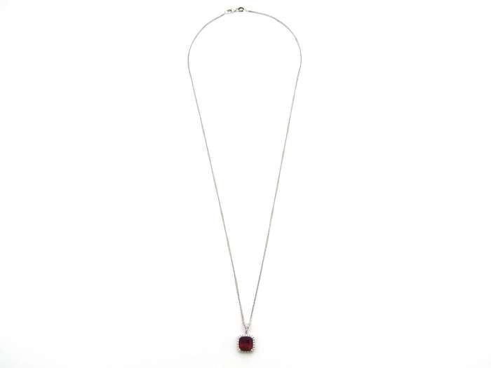 18K gold rubellite tourmaline and diamond pendant.