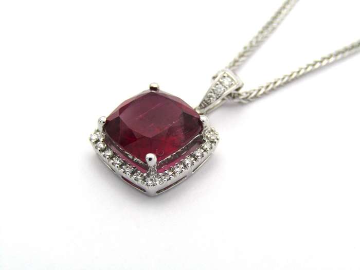 18K gold rubellite tourmaline and diamond pendant.