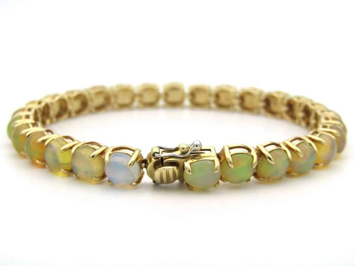 14K gold fire opal bracelet.