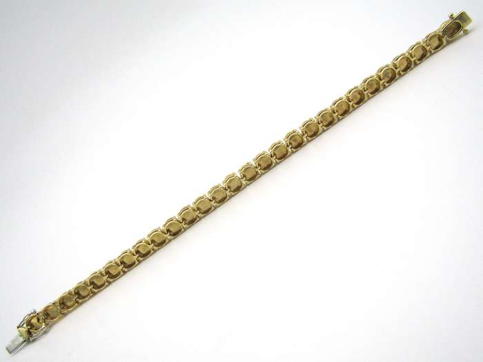 14K gold fire opal bracelet.