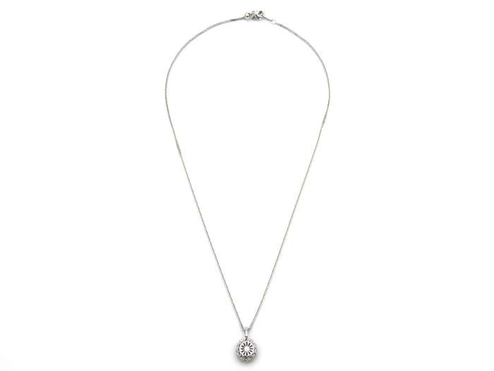 18K gold ruby and diamond pendant.