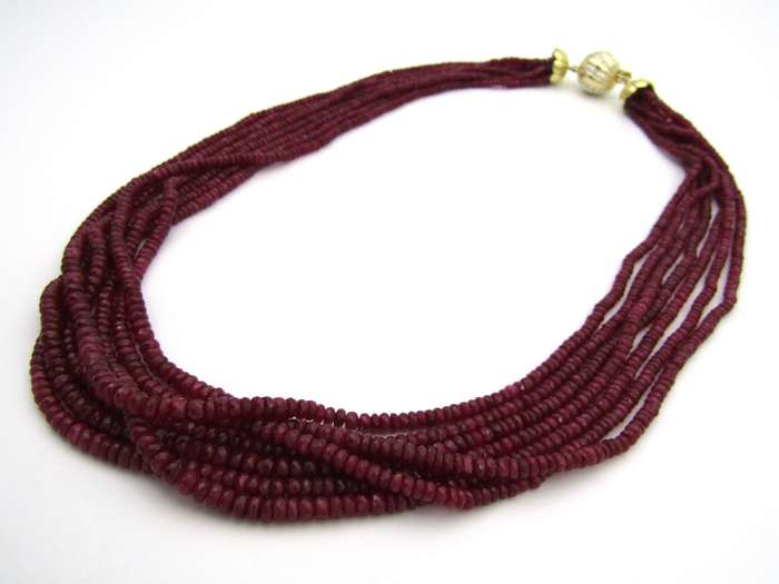 14K gold diamond and 7-strand ruby necklace.
