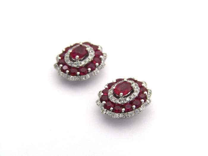 18K gold ruby and diamond earrings.