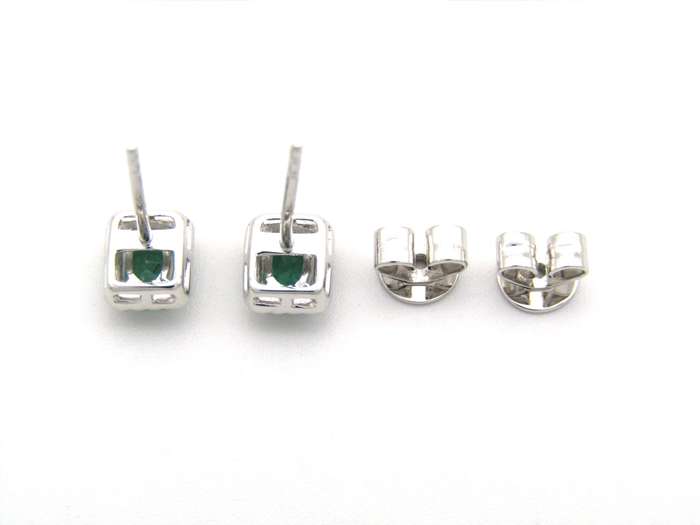 9K gold emerald and diamond earrings.