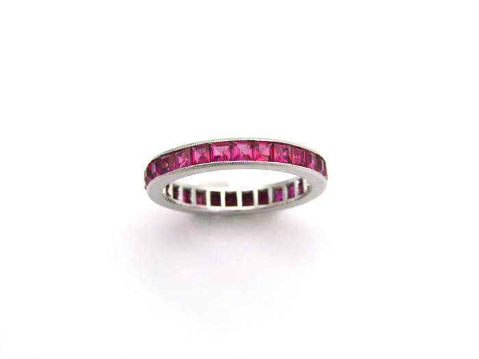 Platinum synthetic ruby eternity ring, circa 1990's.