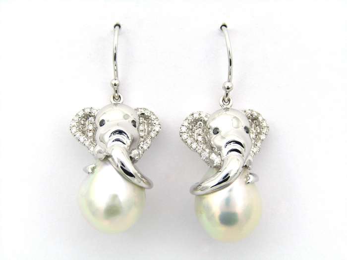 14K gold baroque pearl and diamond elephant earrings.