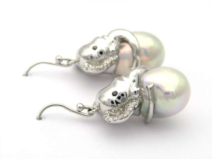 14K gold baroque pearl and diamond elephant earrings.