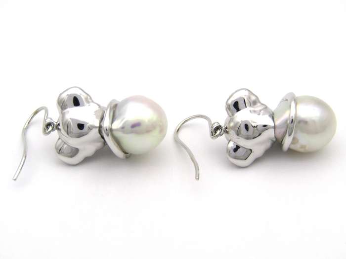 14K gold baroque pearl and diamond elephant earrings.