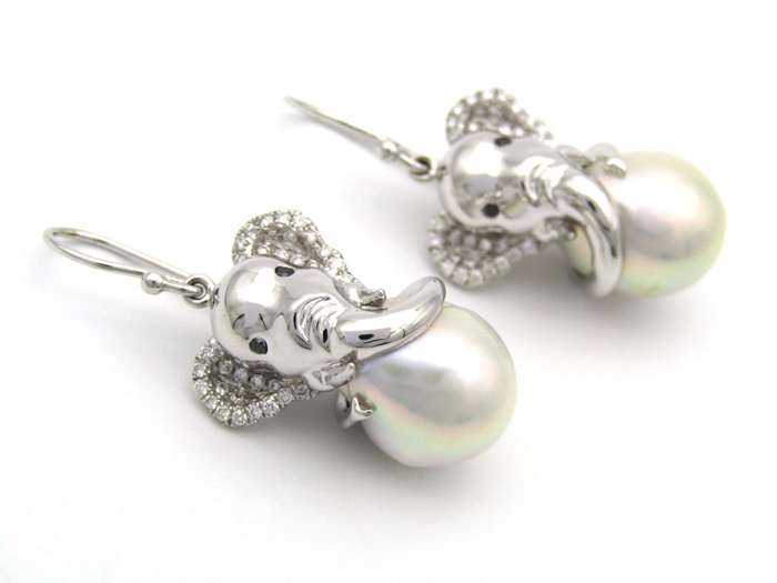 14K gold baroque pearl and diamond elephant earrings.