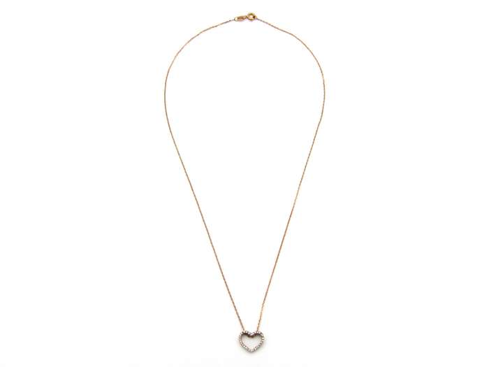 9K gold diamond heart pendant.