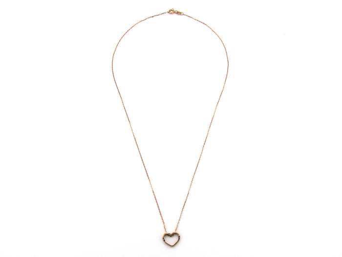 9K gold diamond heart pendant.