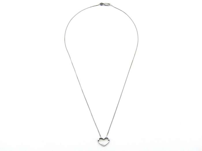 9K gold diamond heart pendant.
