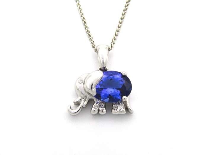 18K gold tanzanite and diamond elephant pendant.