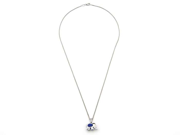 18K gold tanzanite and diamond elephant pendant.