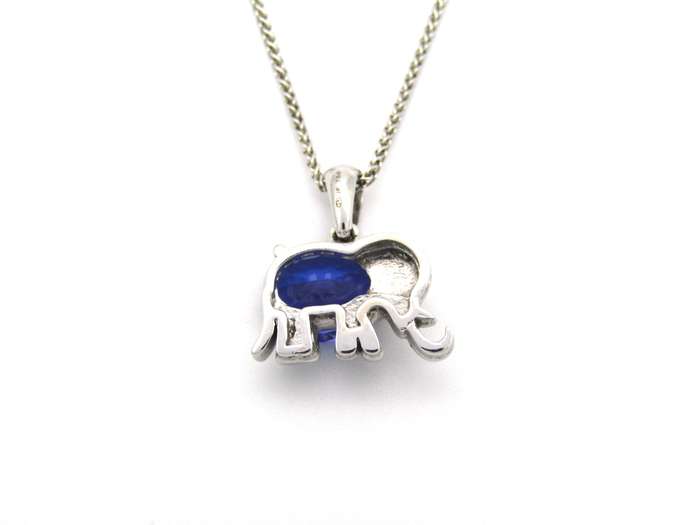 18K gold tanzanite and diamond elephant pendant.