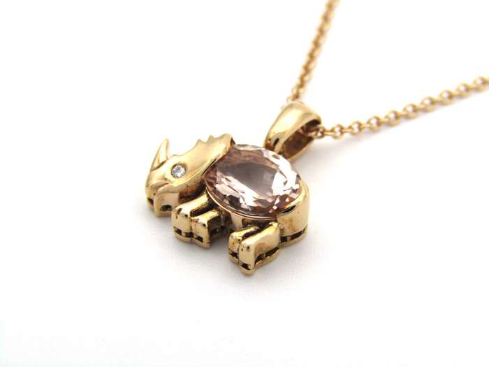 18K gold morganite and diamond rhino pendant.