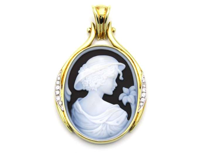 18K gold hard stone cameo and diamond pendant.