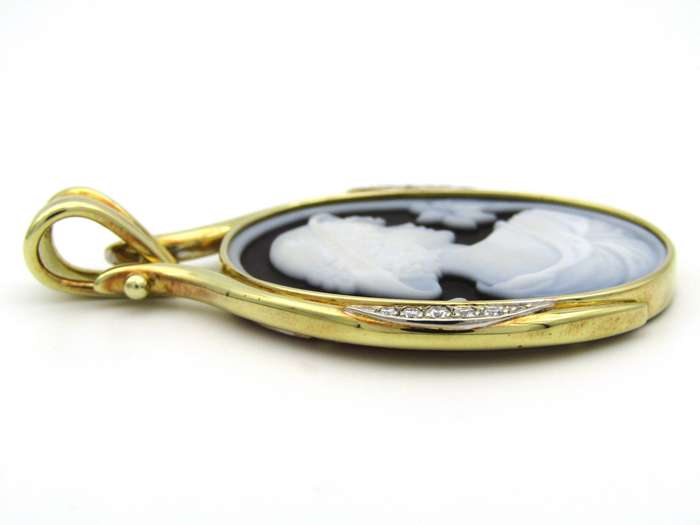 18K gold hard stone cameo and diamond pendant.