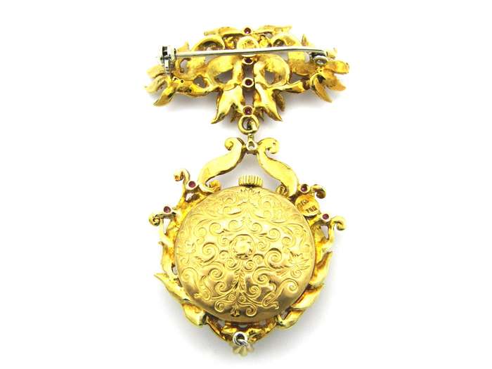 18K gold Edwardian enamel and ruby Montreux watch. Circa 1900.