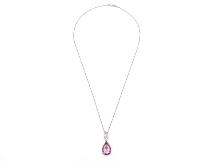18K gold pink sapphire and diamond pendant.