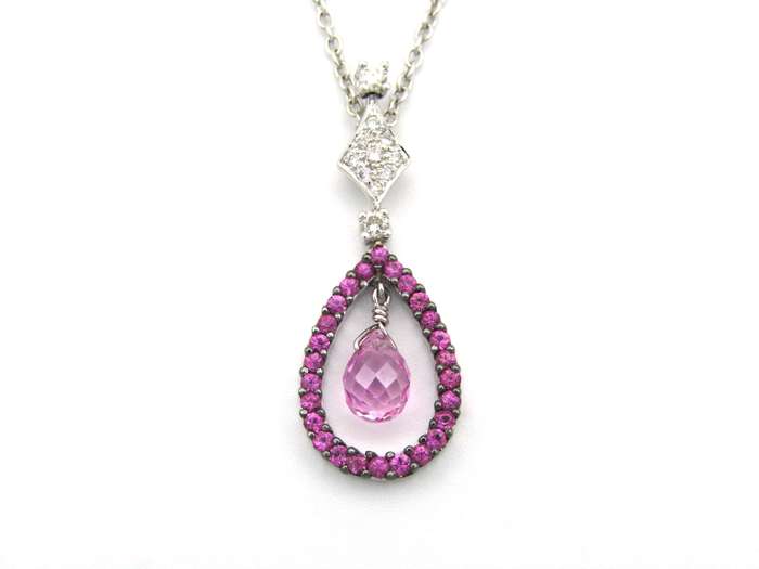 18K gold pink sapphire and diamond pendant.